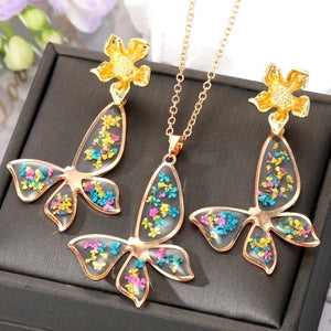 BUTTERFLIES AND BEES Collection: Lucite Butterfly with Real Flowers necklace and earrings set (designed Fall 2023)