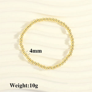 Gold Ball Stretch Bracelet, tiny 1/8” beads (4mm)